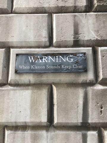 St Stephen's Row back of Mansion House get out when klaxon heard wall sign warning